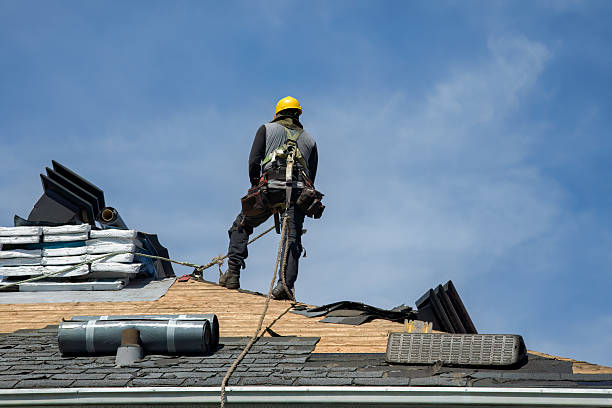 Professional Gutter Installation technician working in Milton, NH